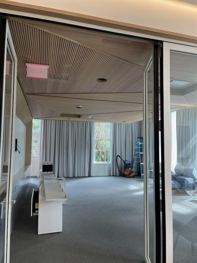 Fluted Millwork in Geometric Pattern on Ceiling